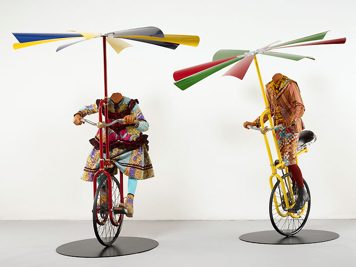 Yinka Shonibare's first solo exhibition in the western United States opens at the Santa Barbara Museum of Art in California featuring an idyllic family riding human-powered flying machines modeled after 19th century drawings, alluding to the continual freedom sought by emigrants and tourists alike.
