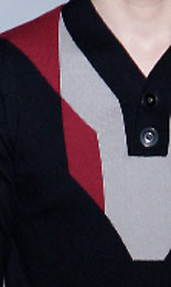fig.: The graphical lines from the summer collection 09 are continued such you can see on this photo. Yurkievich constructs a 3 dimensional collar/shoulder extension. Many of his graphical lines seem to be developed from the cross like you can see on the video above just in the beginning on the shirt in the traditional blue white checked cotton poplin. Photo: Shoji Fuji.