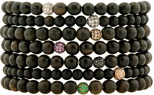 fig.: The bracelet from the 'Touche du Bois' range is made of ebony (wood for luck), diamonds, black diamonds, coloured sapphires, tourmalines, etc. 